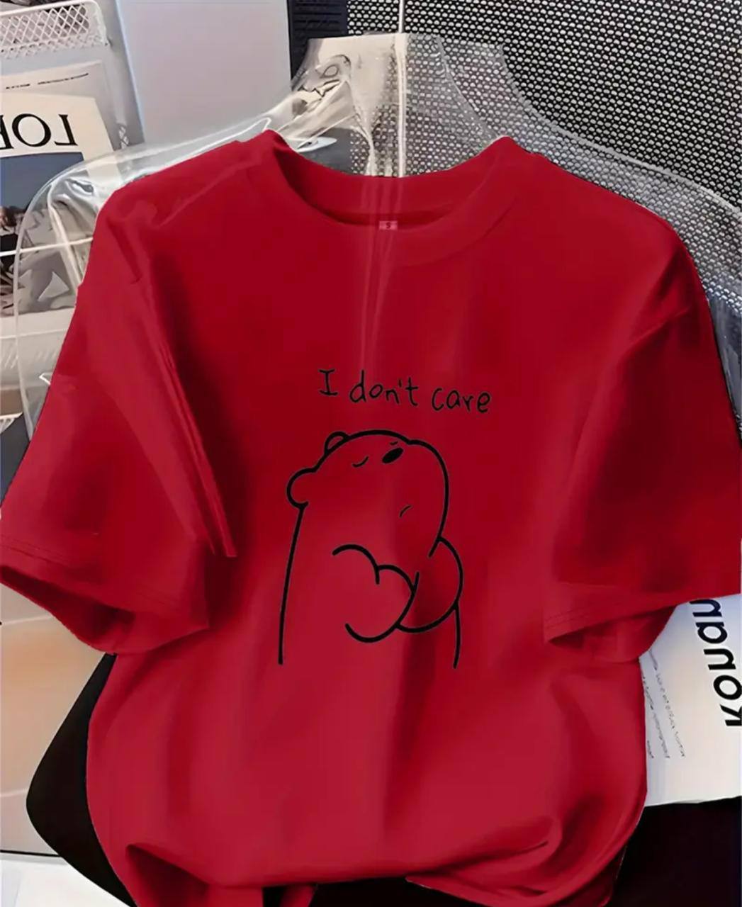 RED TEE WITH 'I DON'T CARE' PRINT