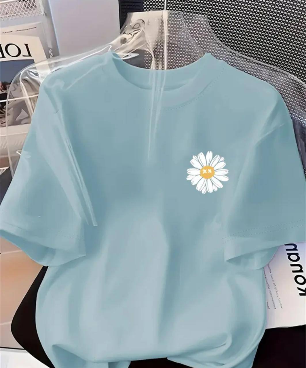 LIGHT BLUE TEE WITH FLORAL DESIGN
