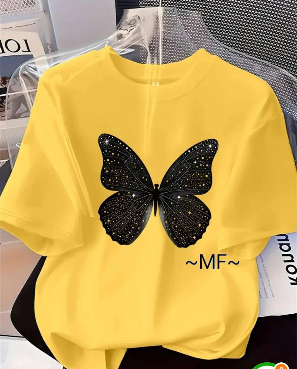 YELLOW TEE WITH A BLACK BUTTERFLY PRINT