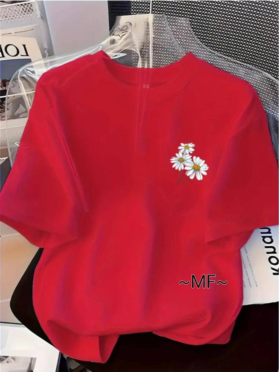 RED TEE WITH A FLORAL DESIGN