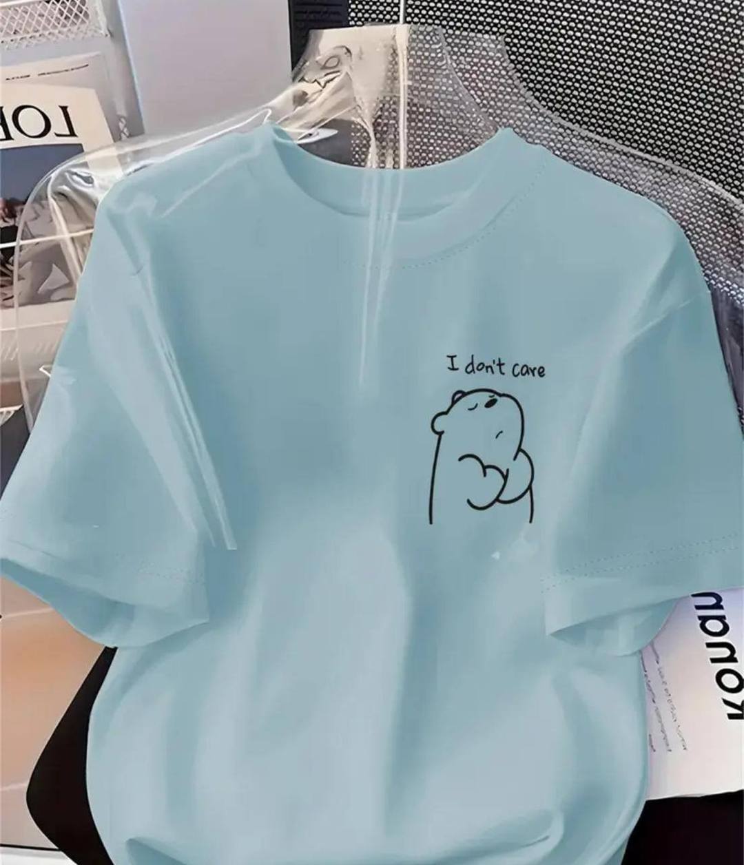 DAZZLING TEE WITH “I DON’T CARE” PRINT – LIGHT BLUE