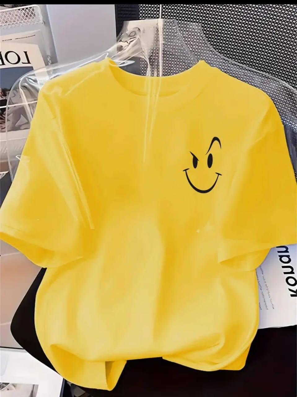 YELLOW TEE WITH AN ATTITUDED SMILEY FACE PRINT