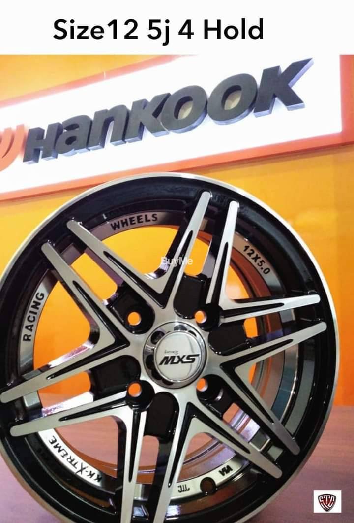 12 INCH ALLOY WHEEL - 4 HOLD - STAR TYPE