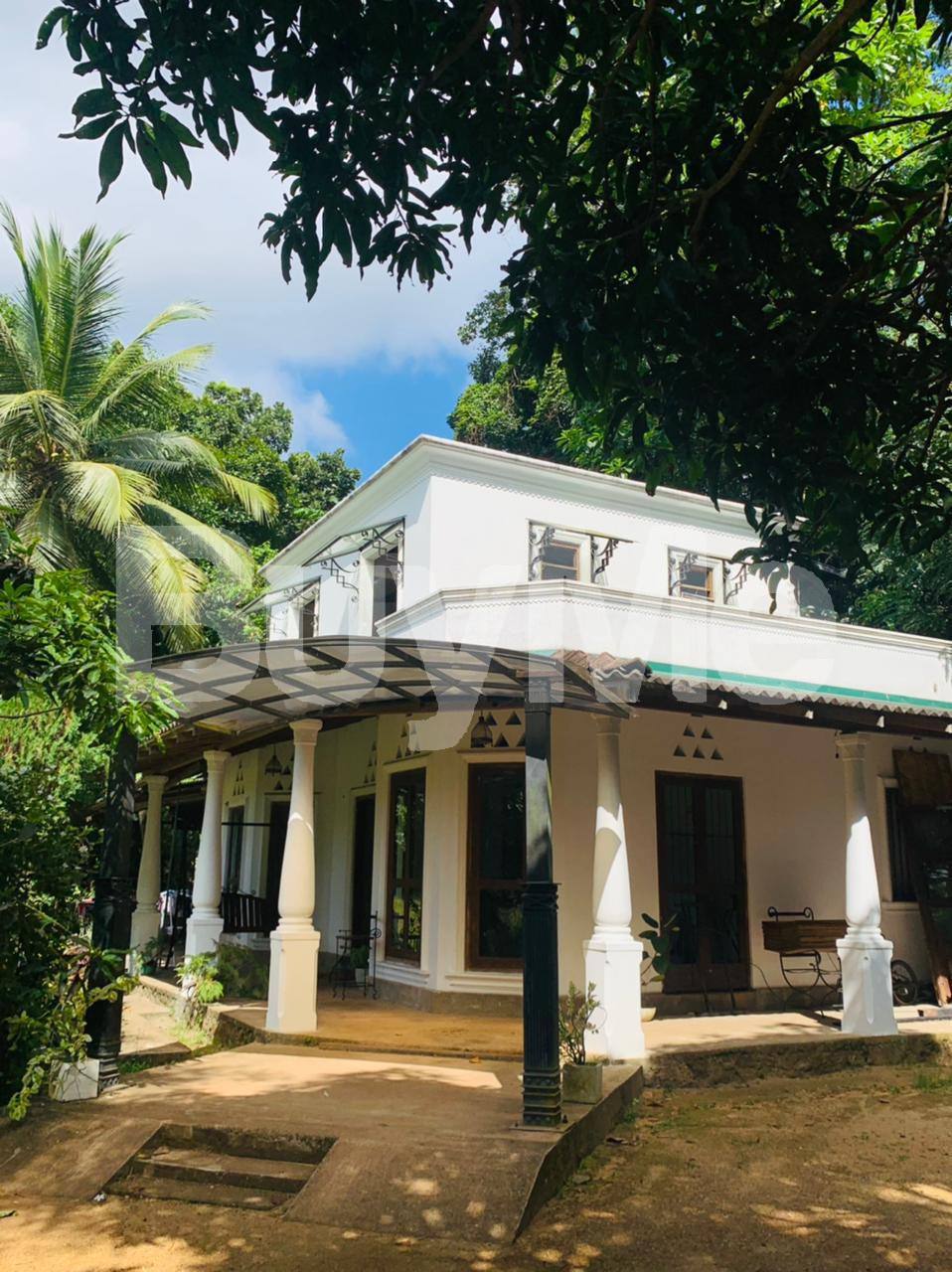 TWO STORY HOUSE AND TWO STORY COMMERCIAL BUILDING FOR SALE IN WELIVERIYA